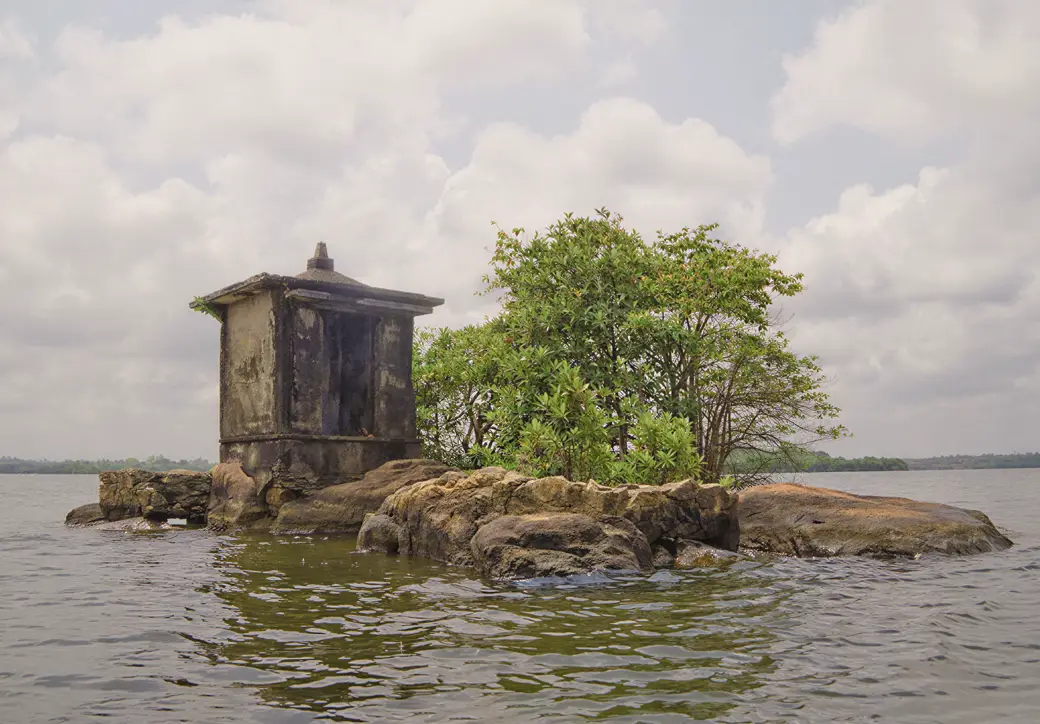 Small Hindu shrine on Five Cent Island in Madu River