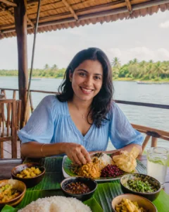Woman enjoying a traditional Sri Lankan lunch near the Madu River