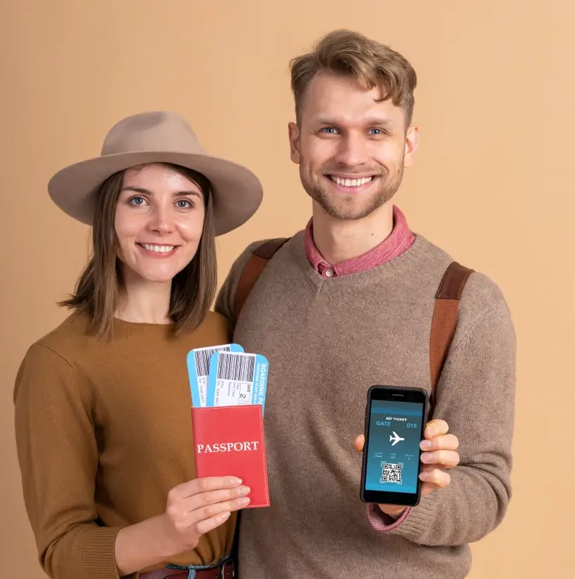 Two tourists holding passports and a mobile phone while enjoying their Sri Lanka trip