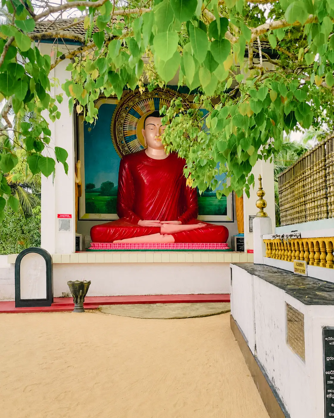 Lord Buddha statue inside Kothduwa Raja Maha Viharaya temple, Madu River, Sri Lanka