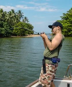 Person fishing near the mouth of the Madu River in Sri Lanka